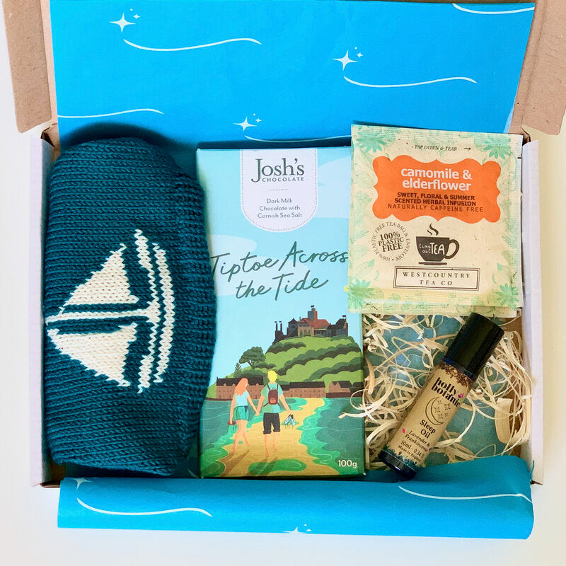 New Mum Letterbox Gift Set with Cornish merino baby beanie, Cornish chocolate, Cornish herbal tea and Devon made aromatherapy sleep oil