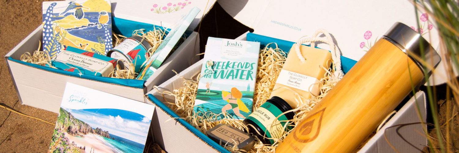 Gift Boxes packed with Devon and Cornish products - shows Beach Gift Set and Outdoors Gift set